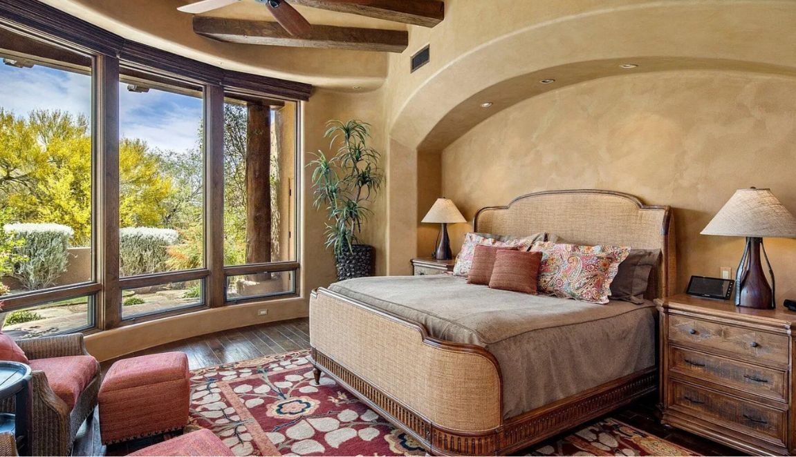 Windy Walk Pueblo custom home featuring warm Southwestern architecture and desert landscaping in Scottsdale, Arizona